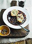 Rich red onion soup with grilled cheese on toast