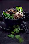 Vegan red quinoa and rice with wild mushrooms, soya chunks, snow peas and black sesame