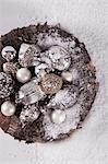 A bowl of antique silver baubles