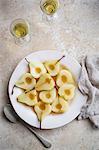 Poached pear halves (seen from above)