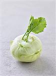 A kohlrabi with leaves