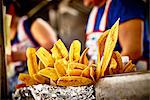 Sweet banana chips in a street kitchen (USA)