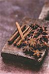 Star anise and cinnamon on a wooden board