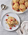 Spaghetti al limone with blistered cherry tomatoes