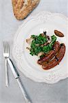 Italian sausage with kale salad