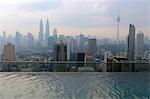 South-East Asia, Malaysia, Kuala Lumpur, the financial center and the Petronas towers, a swimming pool in the foreground