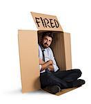 Desperate and fired businessman hides in the cardboard