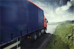 Blue truck on the road with the natural landscape . 3D Rendering