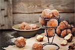 Fresh delicious homemade sour cream ball doughnuts with cinnamon sugar