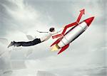 Businessman flying attached to a missile with an arrow. take-off business success concept  . 3D Rendering