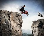 Businessman jumps between two mountains with a small car to get to the flag. Achievement business goal and Difficult career concept