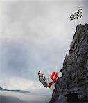 Businessman climb a mountain with a small car to get to the flag. Achievement business goal and Difficult career concept