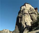 Low angle view of Roussanou Monastery on top of rock formation, Meteora, Thassaly, Greece