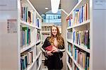 University student working in library