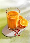 A sunshine smoothie made with bananas, pineapple, mango, oranges and goji berries