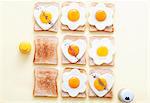 Slices of toast with fried eggs