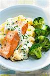 Salmon with a chive sauce, broccoli and mashed potato