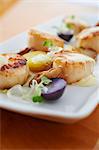 Fried scallops with Beurre Blanc and purple potatoes