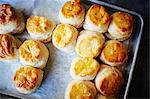 Freshly baked American biscuits on a baking tray