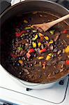 Black bean stew with chipotle in a pot on a stove