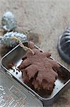 Gluten-free, leaf-shaped shortbread biscuits as decorations