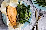 Fish baked in paper with beans and mange tout