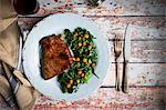 Beef steak with a chickpea and spinach medley