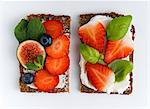 Wholemeal open sandwiches with soya quark and various fruits