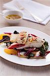 Fillet of fish with chard and orange segments