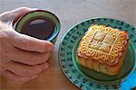 A Chinese mooncake and cup of tea