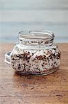 Pepper & apricot salt in a screw-top glass jar