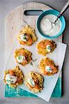 Rösti (fried Swiss potato cake) with smoked salmon and sour cream