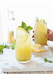 Apple & lemon juice with mint in glasses