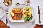 Baked carp with potato and lamb's lettuce