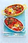 Shakshuka with vegetables, egg and salami