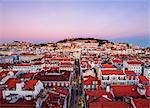 Miradouro de Santa Justa, view over downtown and Santa Justa Street towards the castle hill at sunset, Lisbon, Portugal, Europe