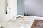 Modern, minimalist home showcase interior bathroom sink and mirror