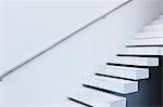 White, modern, minimalist floating staircase