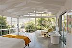 Modern luxury home showcase interior bedroom with garden view