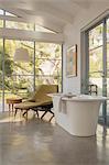 Soaking tub in luxury home showcase hotel bedroom