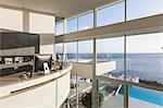 Modern luxury home showcase interior home office with sunny ocean view