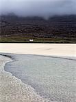 Tranquil view ocean and remote house, Luskentyre Beach, Harris, Outer Hebrides