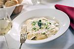 Ravioli topped with a cream sauce in a white bowl, Wakefield Inn, Wakefield, NH.