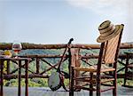 Country deck with banjo and hat, Laurel Lodge, Harper's Ferry, WV.