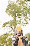 Mature woman holding a leaf