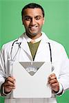 Doctor holding bathroom scales