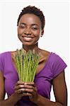 Woman holding asparagus