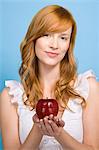 Woman holding an apple