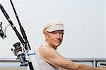 Senior man with fishing rod