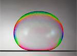 Still life of large bubble on flat surface